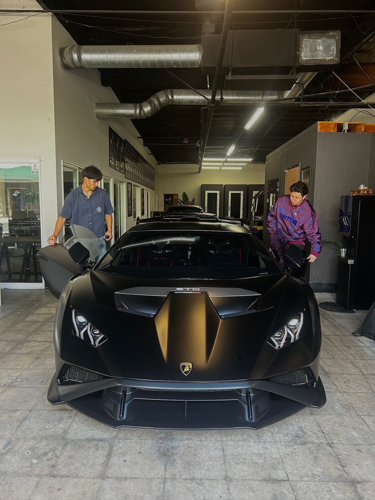 Keanu Vasquez with his Lamborghini Huracán STO